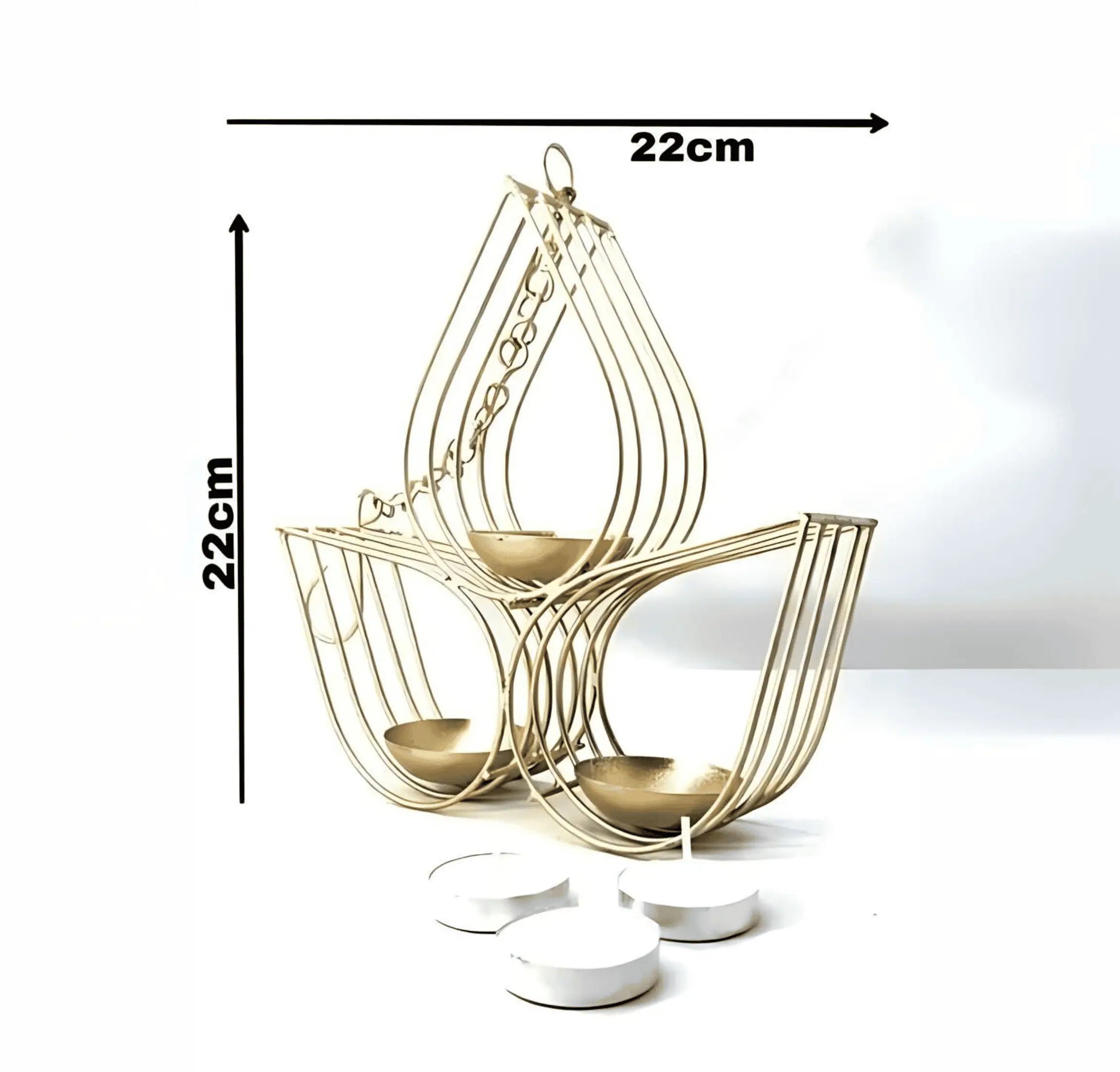Gold metal candle holder with three tiers and three white tea light candles, shown with black dimension lines indicating a height and width of 22cm on a white background.